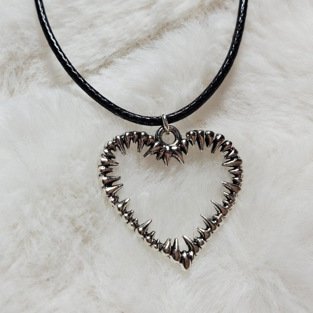 Gothic spiked heart necklace.